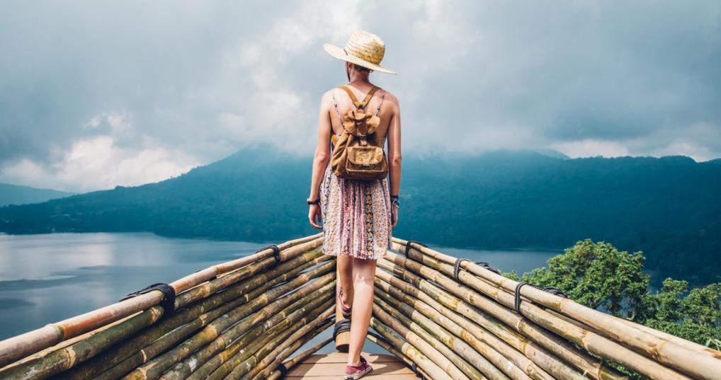 Female tourist looking out over a view of mountains