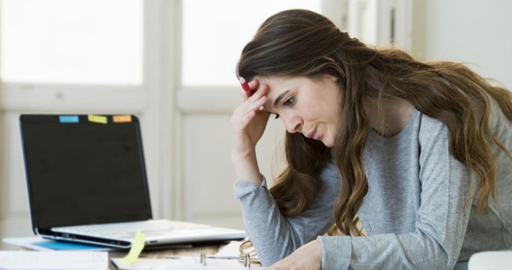 Young woman who can't pay her bills