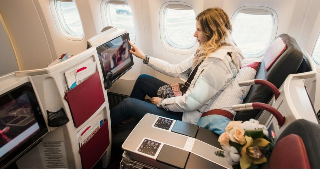 Woman in first-class who upgraded with United miles