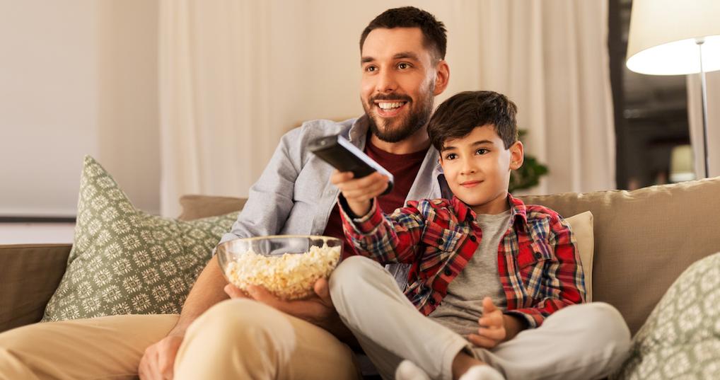 Father and son watching TV