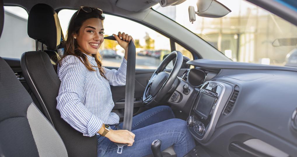 Woman in new car