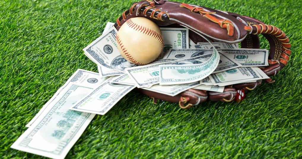 Baseball glove full of money
