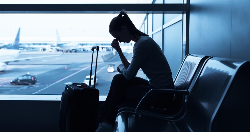 Stressed woman at airport