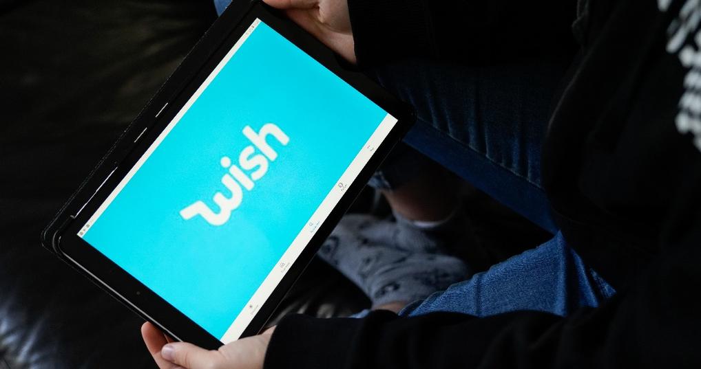 Wish sign logo store application on tablet screen