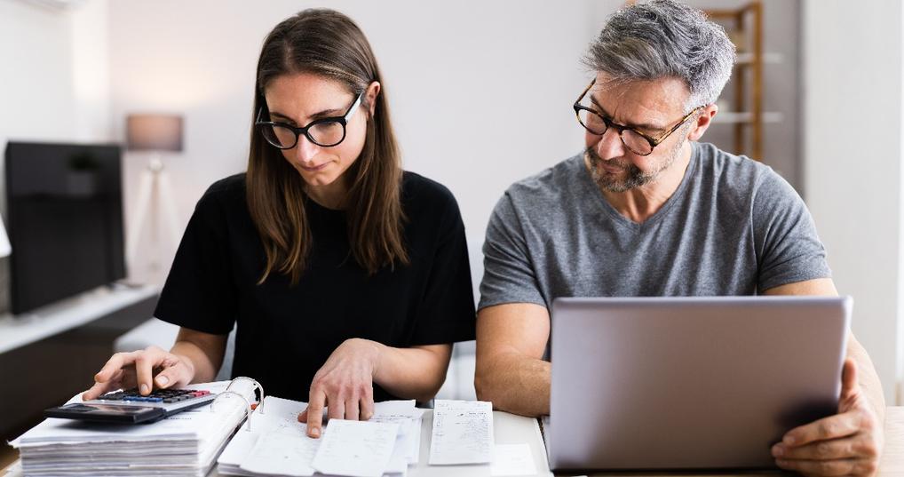 couple doing taxes and family budget