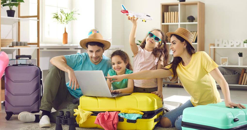 family and daughter children buying payment for flight ticket