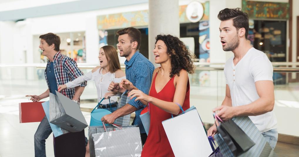 young people are engaged in shopping on a black Friday