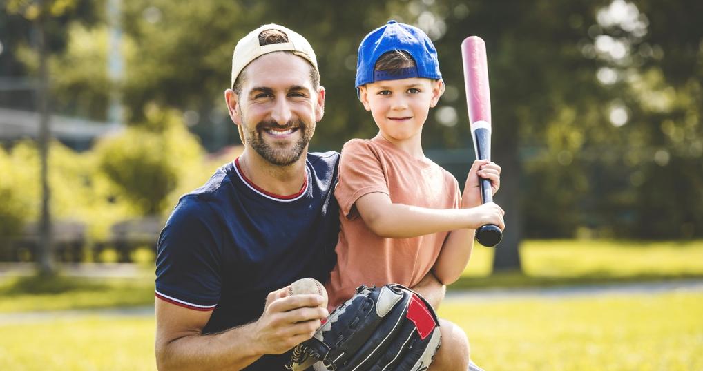 Father and son playing baseball