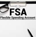 papers with flexible spending account FSA on a table