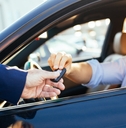 Man receiving keys for car