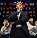 tensioned investors analyzing crisis on stock market
