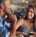 young couple on a date in a cafe