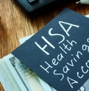 health savings account note on a diary