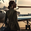 A wealthy woman going on a private jet