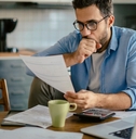 man going over his bills