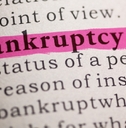Bankruptcy highlighted on paper