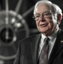 warren buffett in front of clock