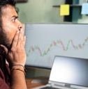 trader shocked due to sudden market crash while trading