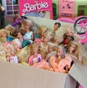 Barbie dolls packed in a cardboard box