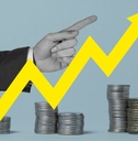 graphic of stacks of coins with a finger pointing up and a yellow arrow showing upward growth