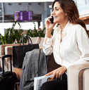 Business woman in an airport lounge