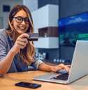 Woman with laptop and credit card