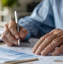 An elderly person discussing annuities with a financial advisor