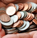 Hand full of coins
