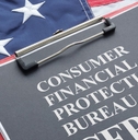 CFPB on paper with American flag