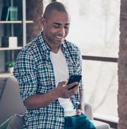 man looking at phone