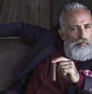 millionaire looking at camera