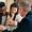 real estate agent explaining agreement to a couple