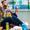 young couple sitting on supermarket floor eating snacks while having fun