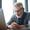 senior man sitting at  laptop