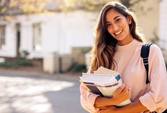 College student holding books