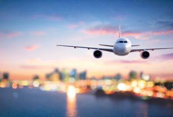 Airplane flying over water