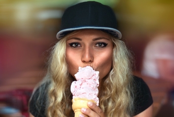 Woman eating ice cream cone