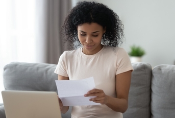 Woman looking at paperwork