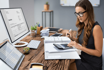 Woman doing side hustle taxes