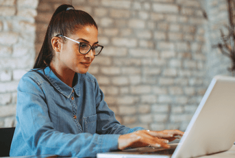 Woman reviewing credible personal loans