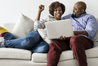 Couple using TurboTax to file their taxes