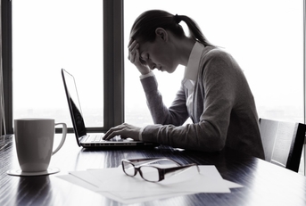 stressed woman in office
