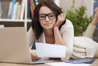 Woman looking at paperwork