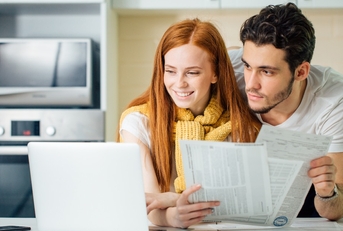 Couple looking at computer