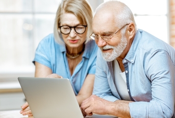 Couple looking at computer