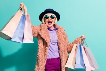 Senior lady holding shopping bags
