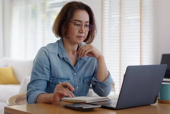 Woman contemplating her finances