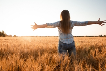 Woman in wheat field