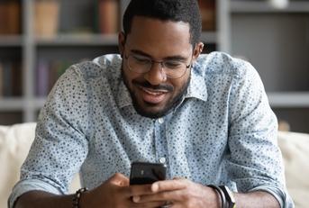 Man playing game on phone