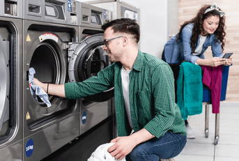 couple at laundromat